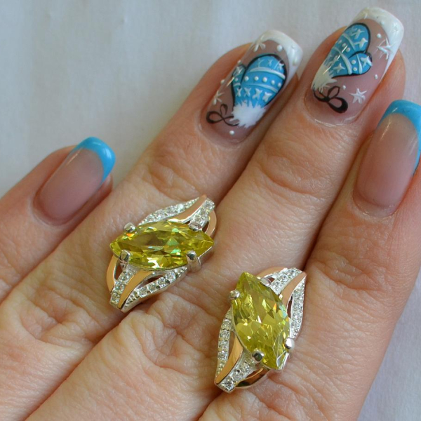 Срібні сережки з золотими пластинами