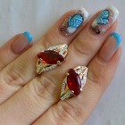 Срібні сережки з золотими пластинами