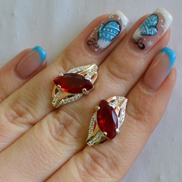 Срібні сережки з золотими пластинами