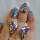 Срібні сережки з золотими пластинами