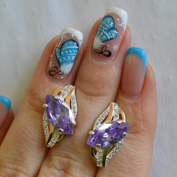 Срібні сережки з золотими пластинами