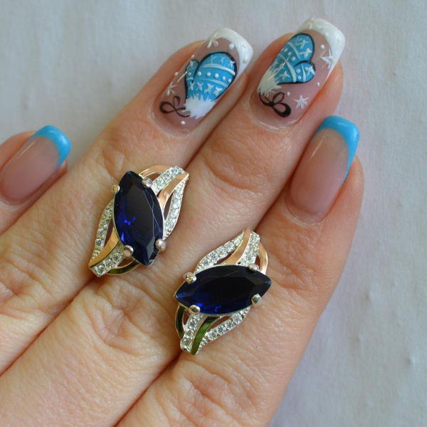 Срібні сережки з золотими пластинами