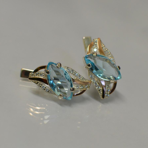 Срібні сережки з золотими пластинами