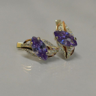 Срібні сережки з золотими пластинами