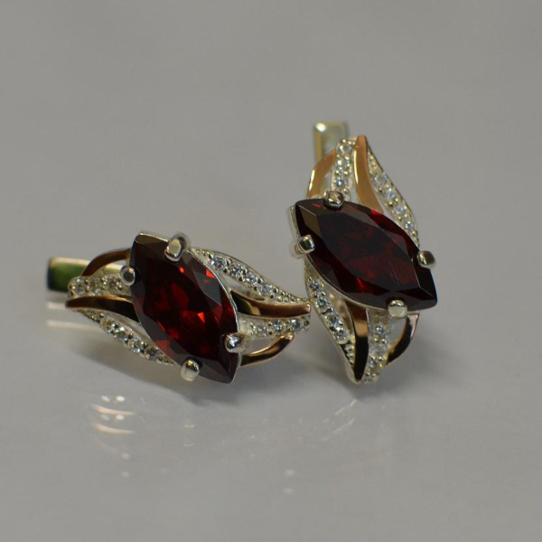 Срібні сережки з золотими пластинами