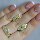 Срібний набір з золотими пластинами