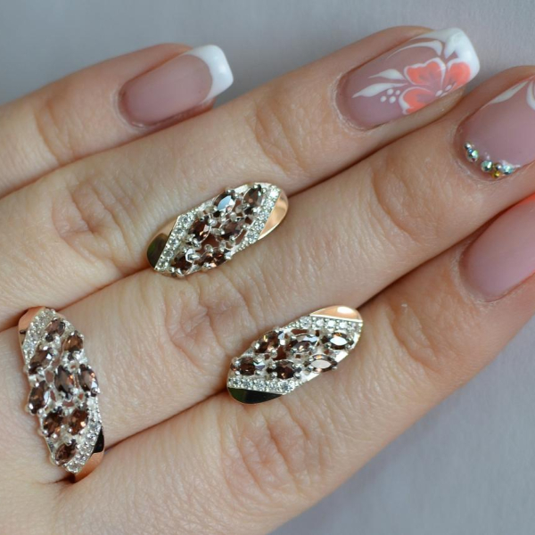 Срібний набір з золотими пластинами