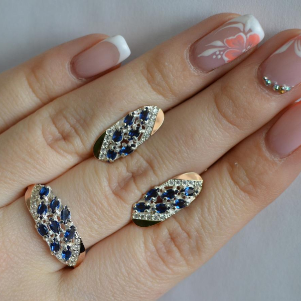 Срібний набір з золотими пластинами