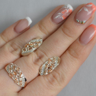 Срібний набір з золотими пластинами