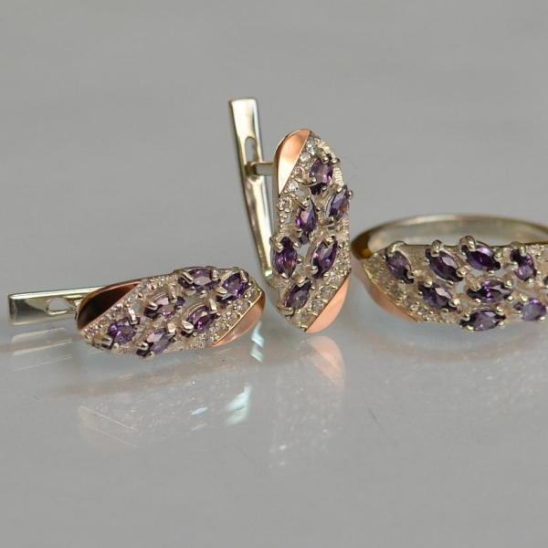 Срібний набір з золотими пластинами