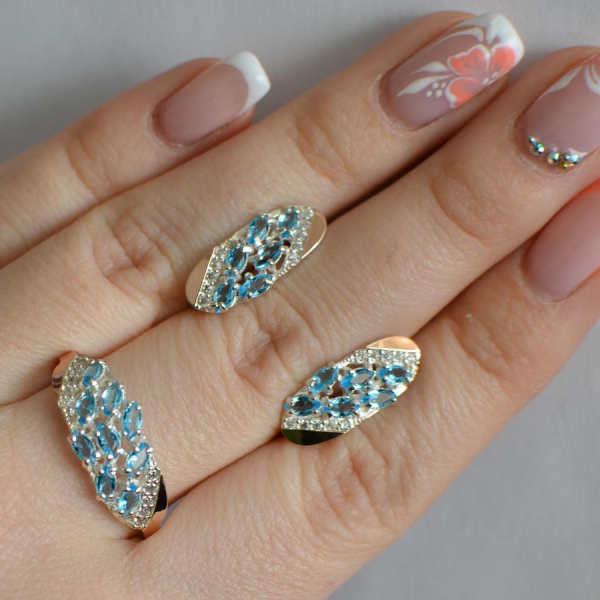 Срібний набір з золотими пластинами