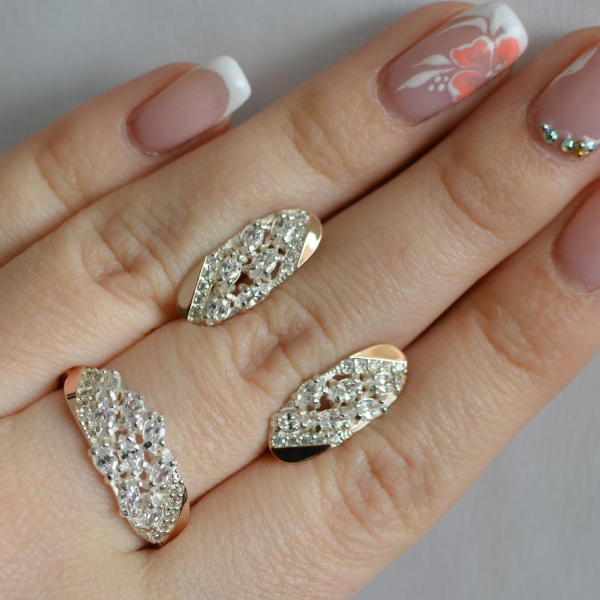 Срібний набір з золотими пластинами