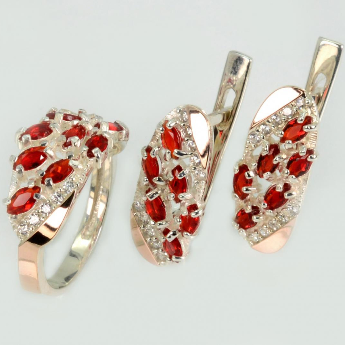 Срібний набір з золотими пластинами