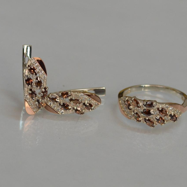 Срібний набір з золотими пластинами