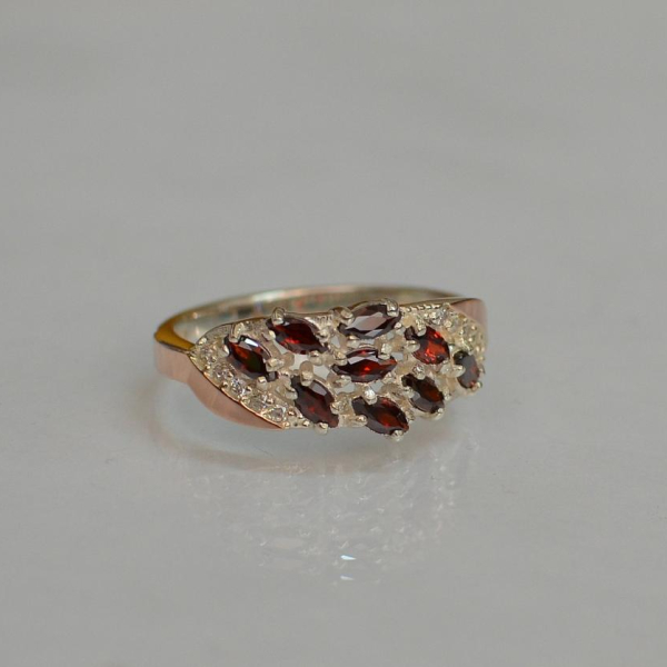 Срібна каблучка з золотими пластинами