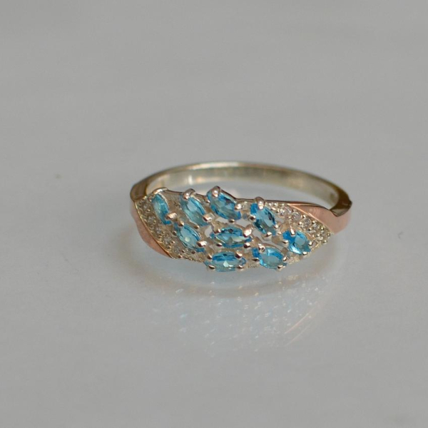 Срібна каблучка з золотими пластинами