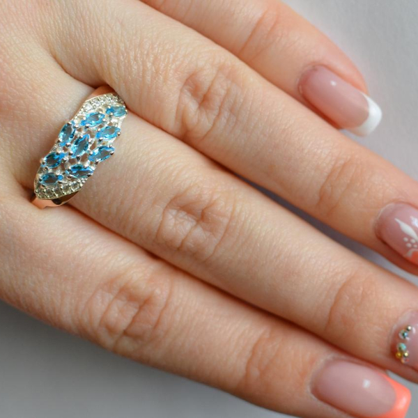 Срібна каблучка з золотими пластинами