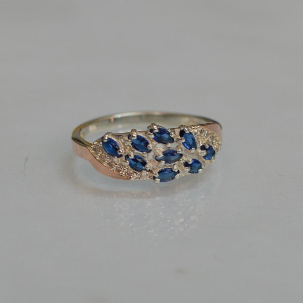 Срібна каблучка з золотими пластинами