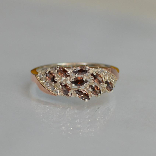 Срібна каблучка з золотими пластинами