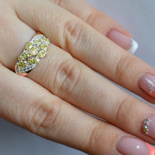 Срібна каблучка з золотими пластинами