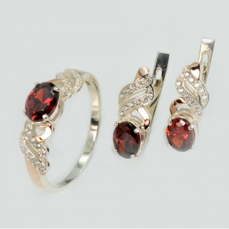 Срібний набір з золотими пластинами