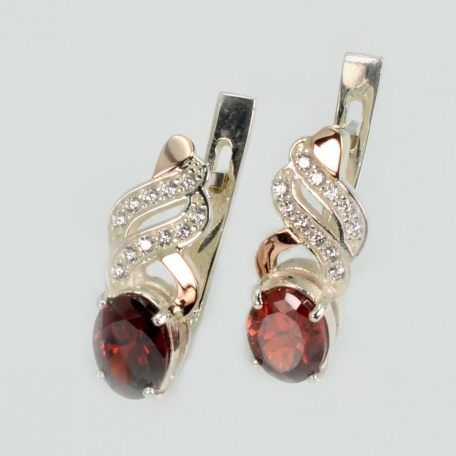 Срібні сережки з золотими пластинами