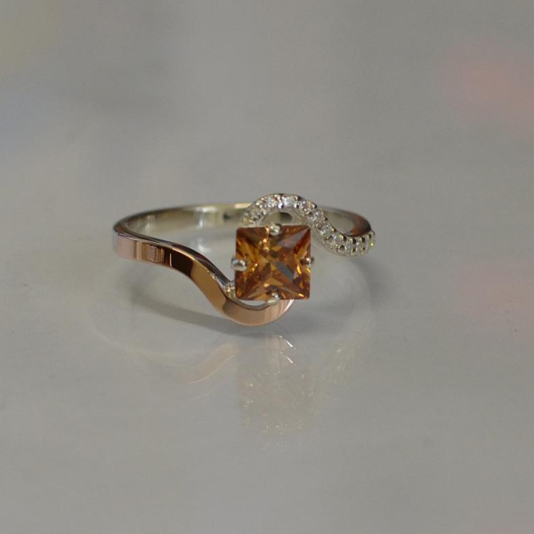 Срібна каблучка з золотими накладками