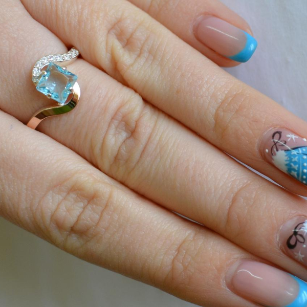 Срібна каблучка з золотими накладками