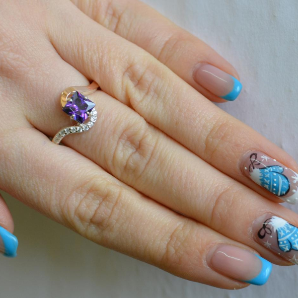 Срібна каблучка з золотими накладками