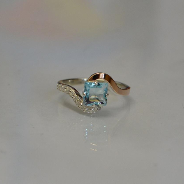 Срібна каблучка з золотими накладками