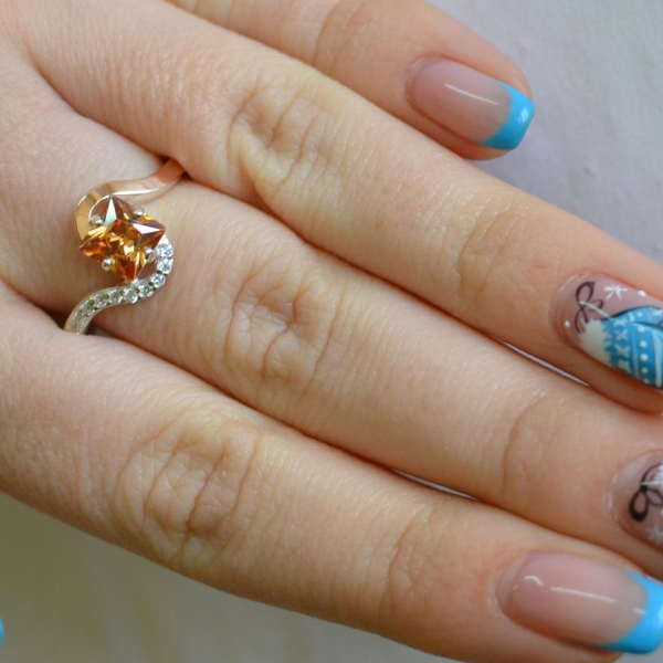 Срібна каблучка з золотими накладками