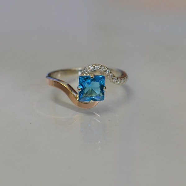 Срібна каблучка з золотими накладками