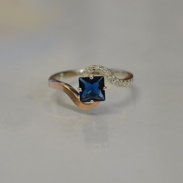 Срібна каблучка з золотими накладками