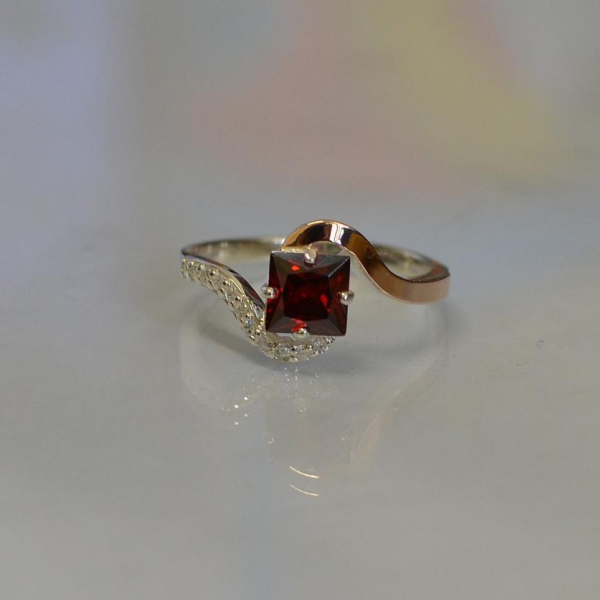 Срібна каблучка з золотими накладками