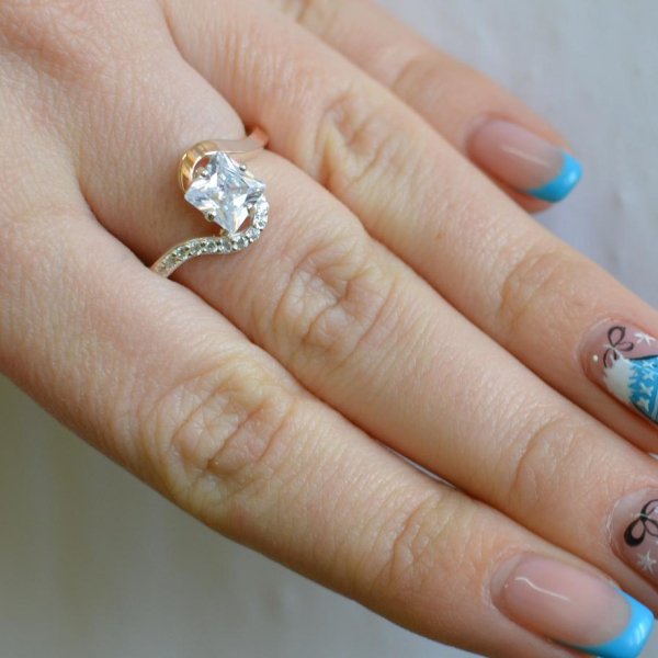 Срібна каблучка з золотими накладками