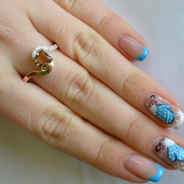 Срібна каблучка з золотими накладками