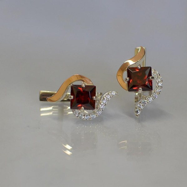 Срібні сережки з золотими накладками