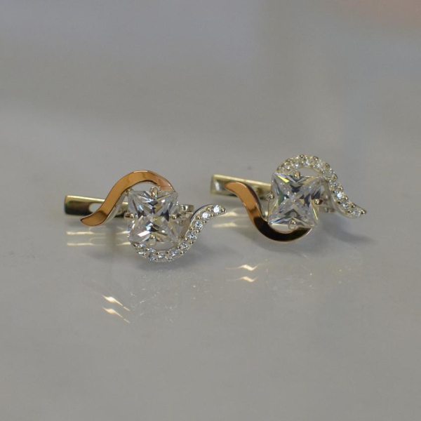 Срібні сережки з золотими накладками