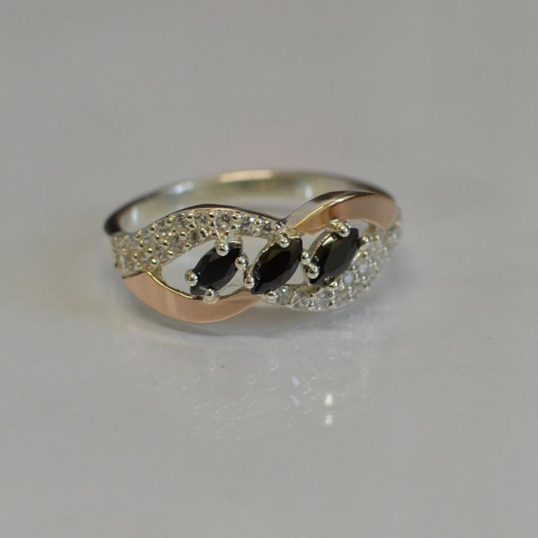 Срібна каблучка з золотими пластинами