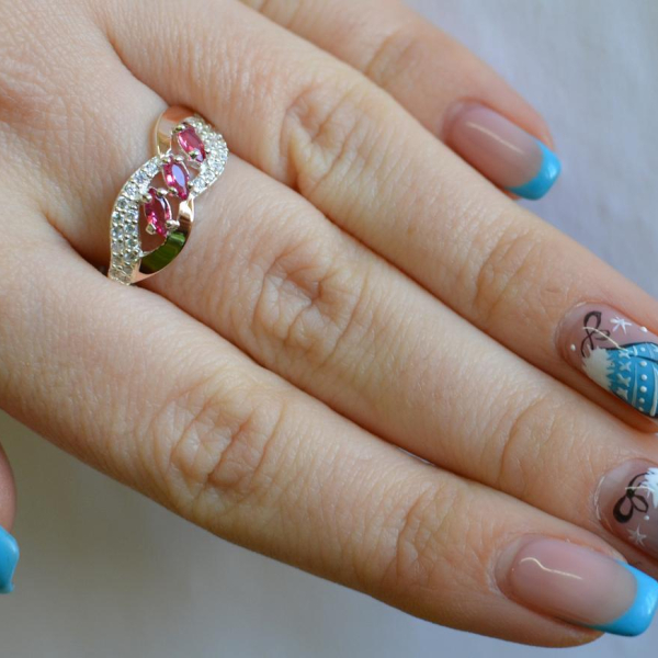 Срібна каблучка з золотими пластинами