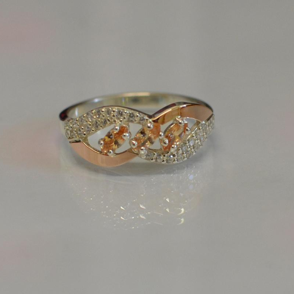 Срібна каблучка з золотими пластинами