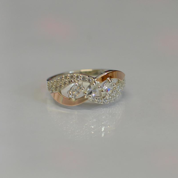 Срібна каблучка з золотими пластинами