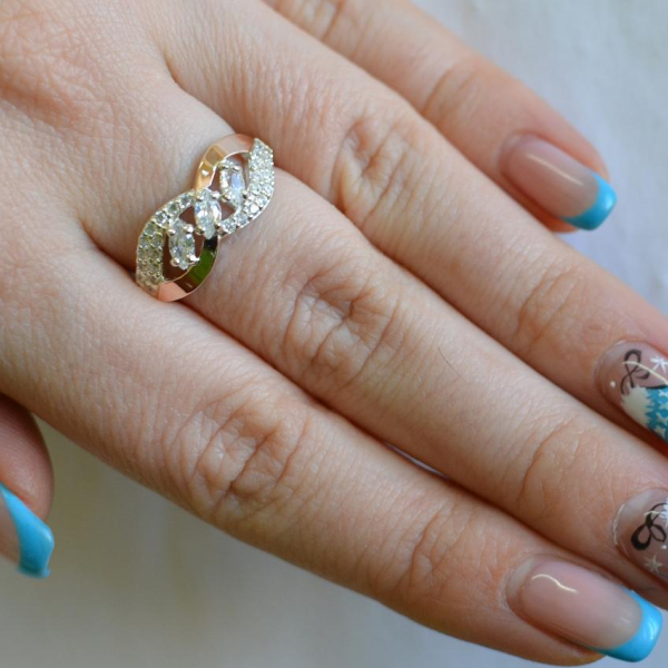 Срібна каблучка з золотими пластинами