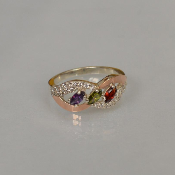 Срібна каблучка з золотими пластинами