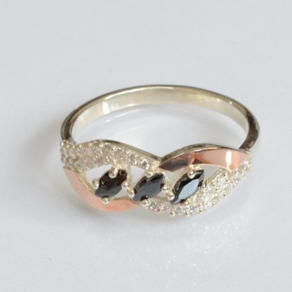 Срібна каблучка з золотими пластинами