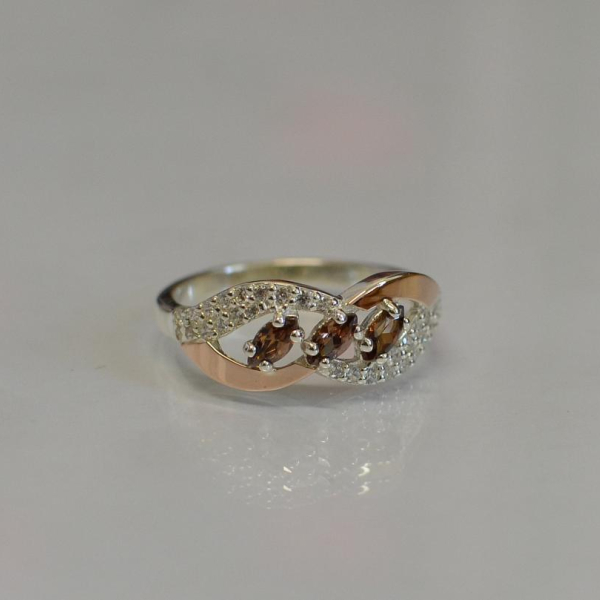 Срібна каблучка з золотими пластинами