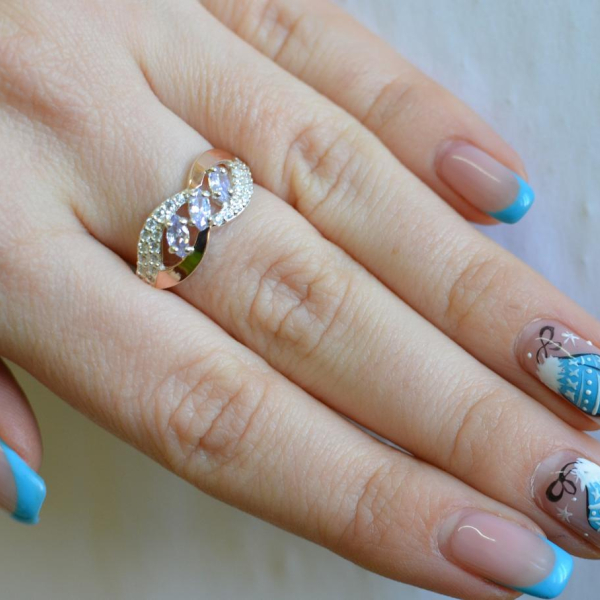 Срібна каблучка з золотими пластинами