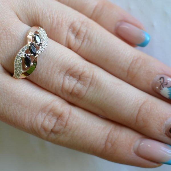 Срібна каблучка з золотими пластинами