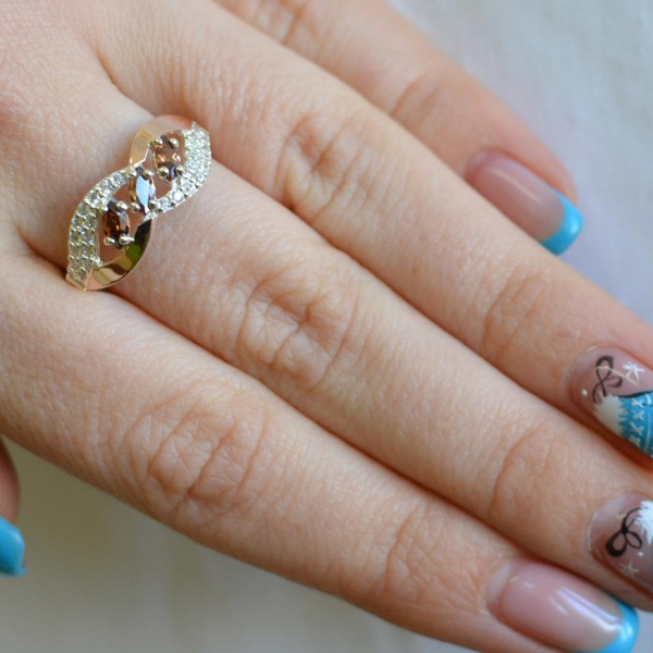 Срібна каблучка з золотими пластинами