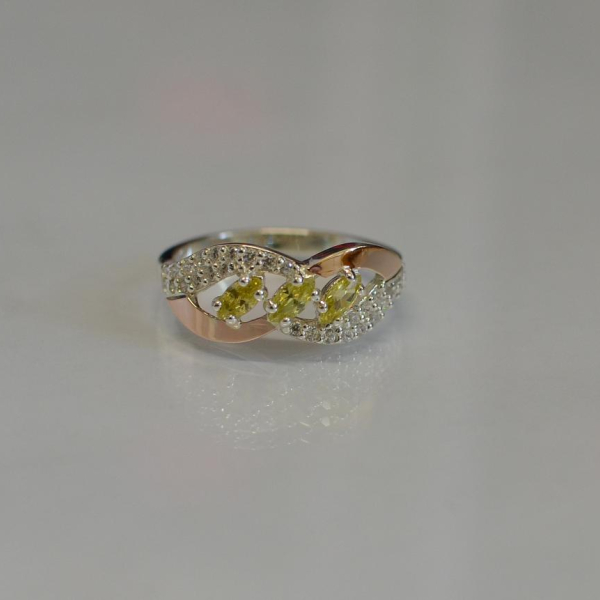 Срібна каблучка з золотими пластинами